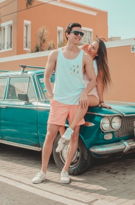 man and woman sitting on car.jpg